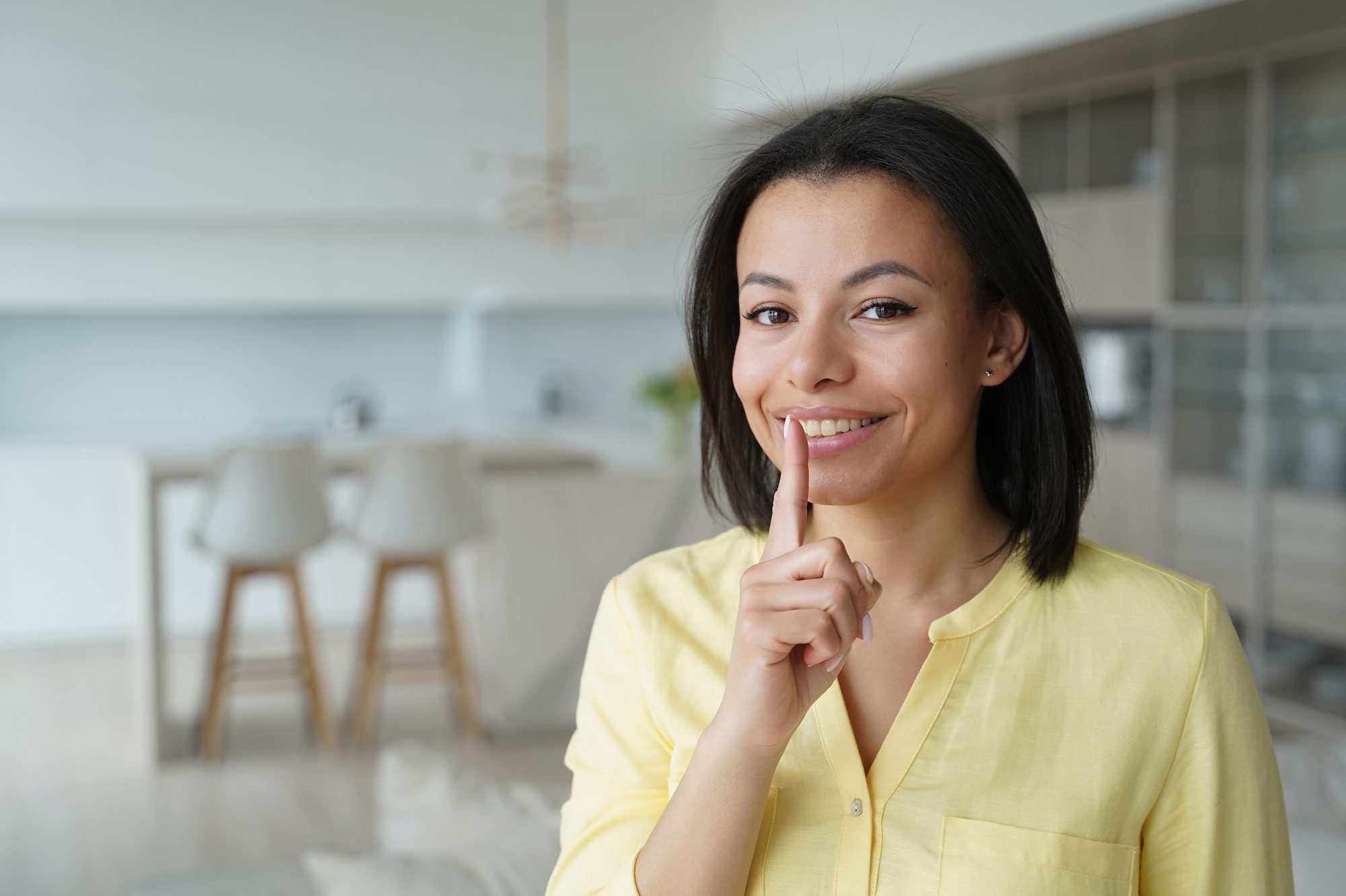 Female makes silence gesture, share secret at home. Unique sale offer, big discounts in online store